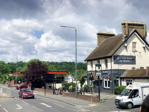 Pub situated to the side of a street