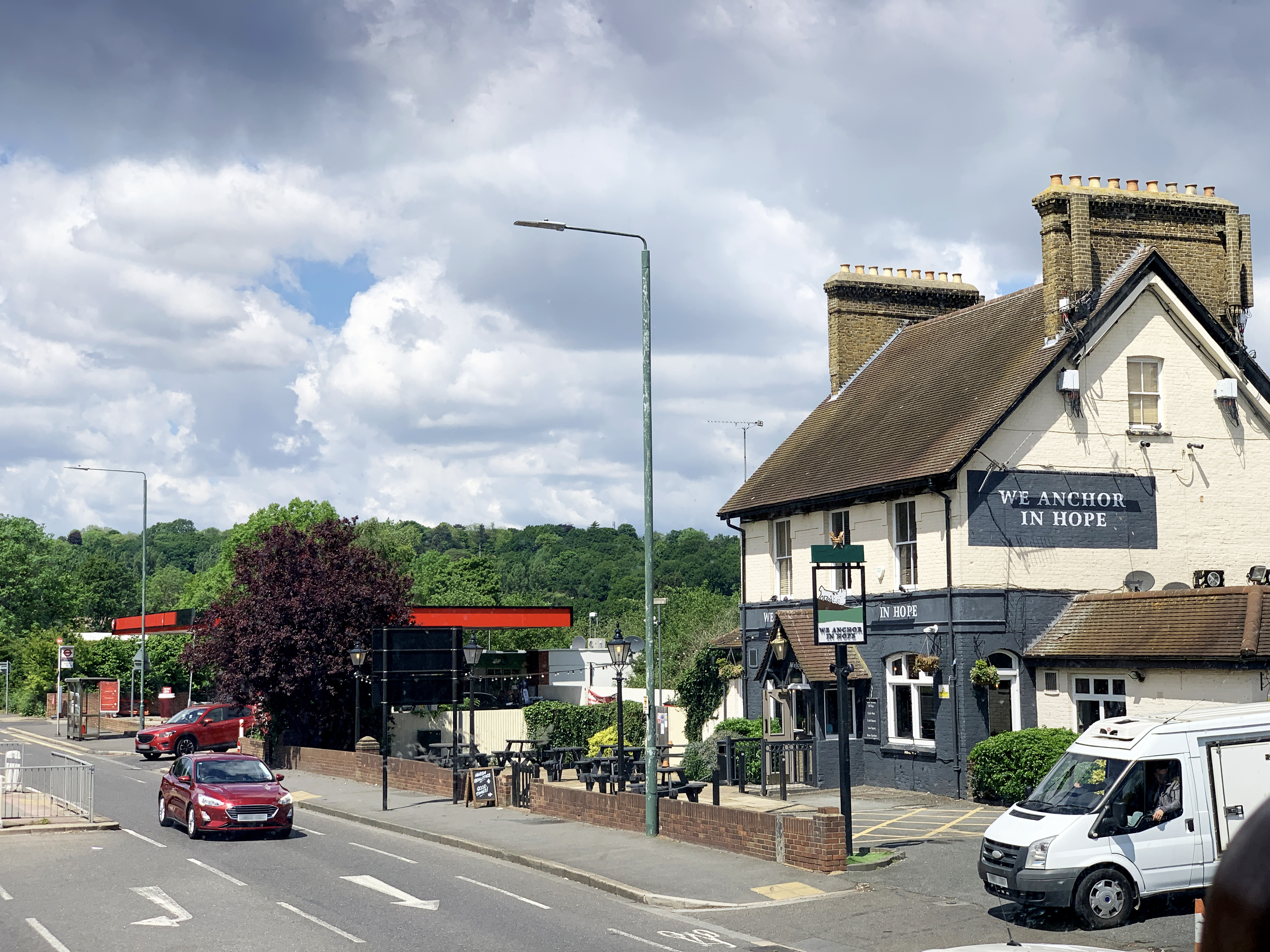 Pub situated to the side of a street